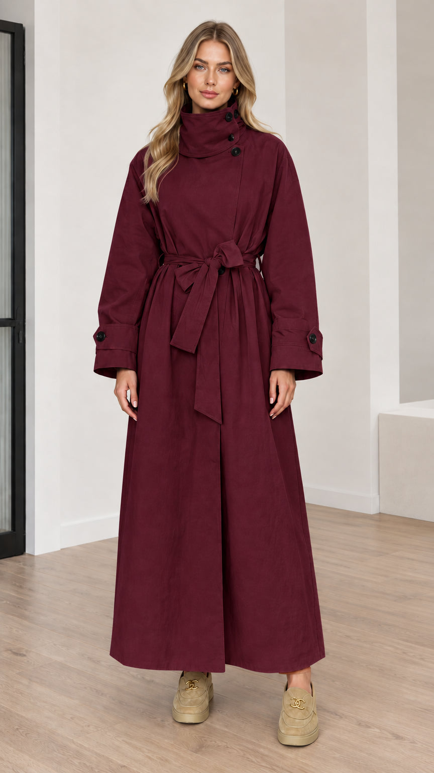Full length view of women's burgundy high neck maxi trench coat