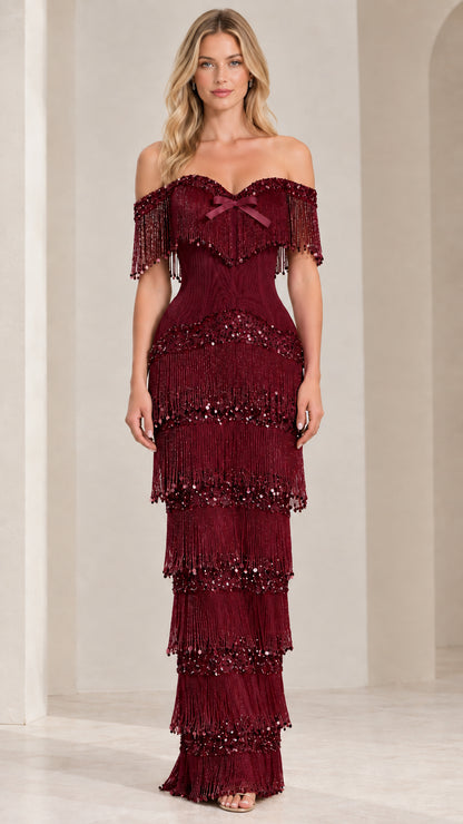 Front view of burgundy off-shoulder tiered fringe maxi evening dress
