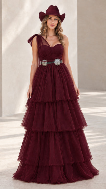 Model wearing burgundy wine tiered tulle ballgown
