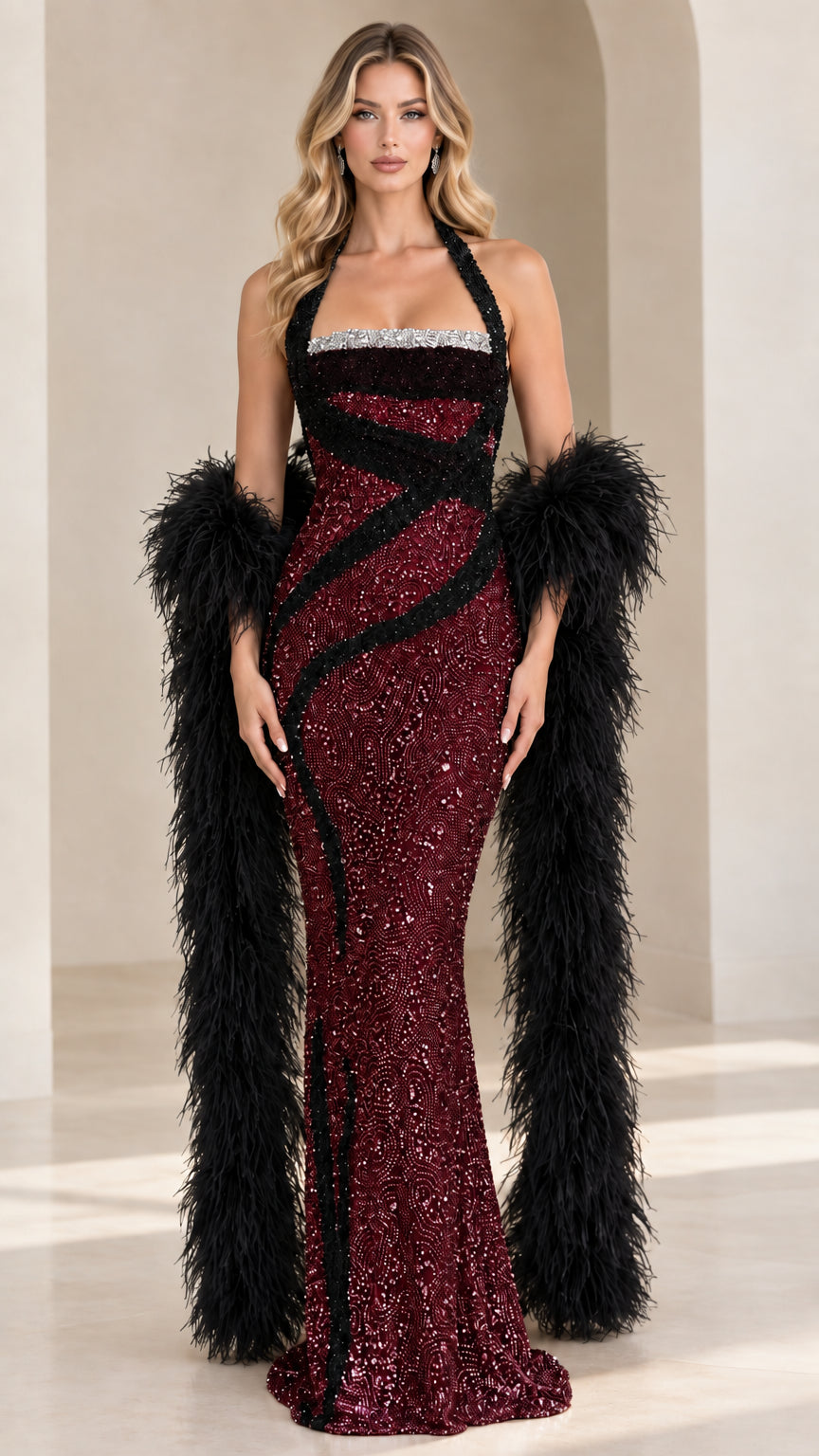 Model wearing burgundy wine red halter sequin formal gown with black lines