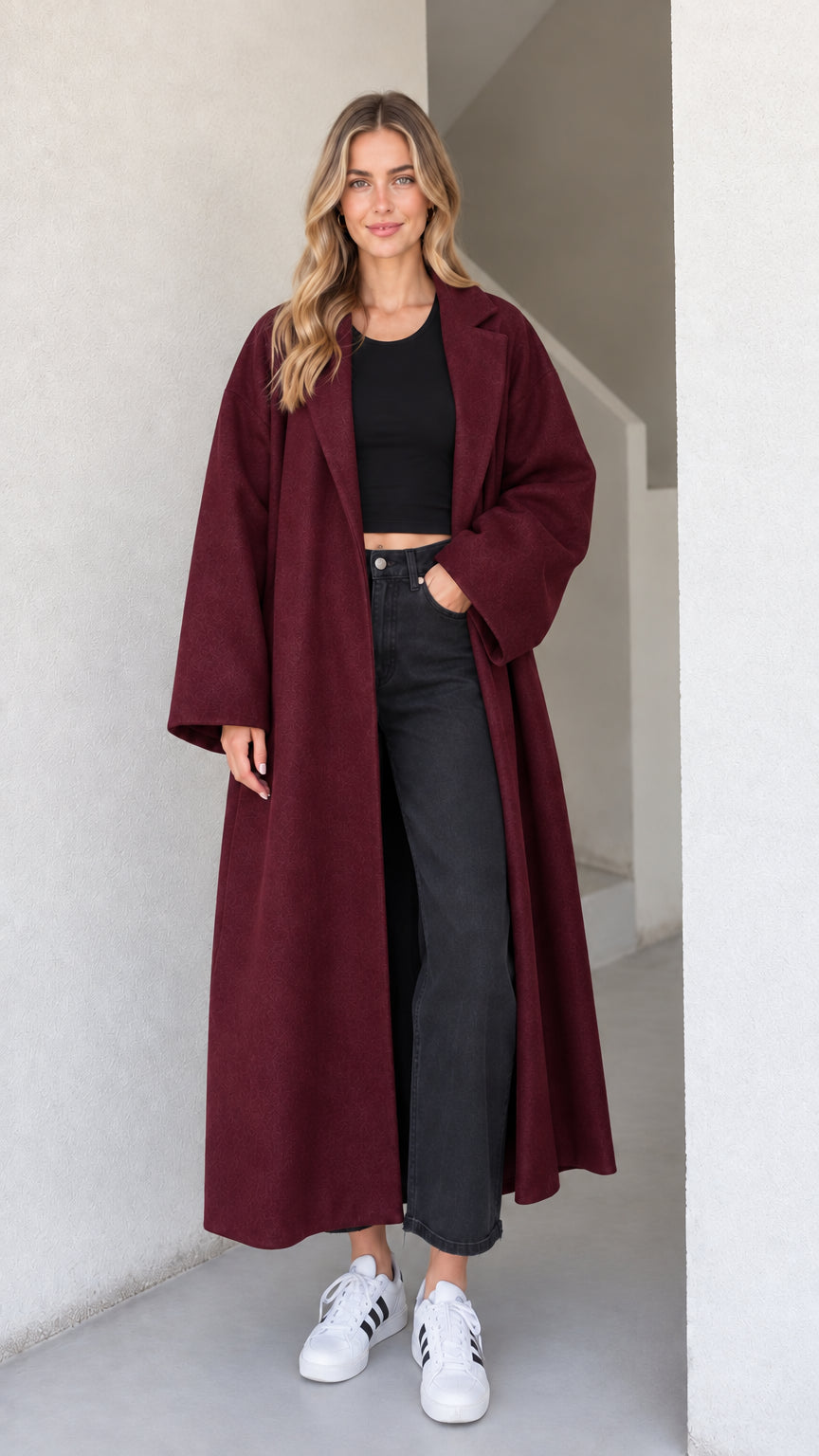 Front view of the women's oversized maxi coat in burgundy wine red
