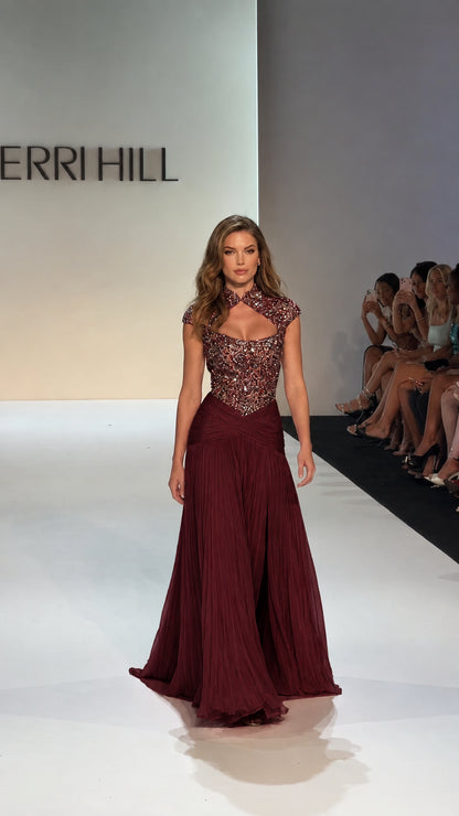 Model in Burgundy wine embellished floor-length evening gown