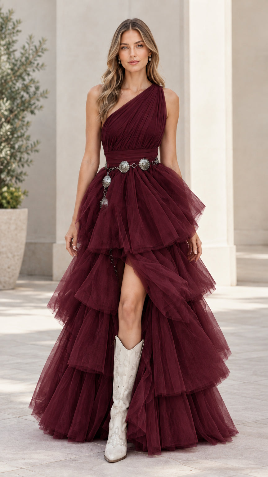 Model wearing burgundy wine one-shoulder tiered tulle maxi dress with slit