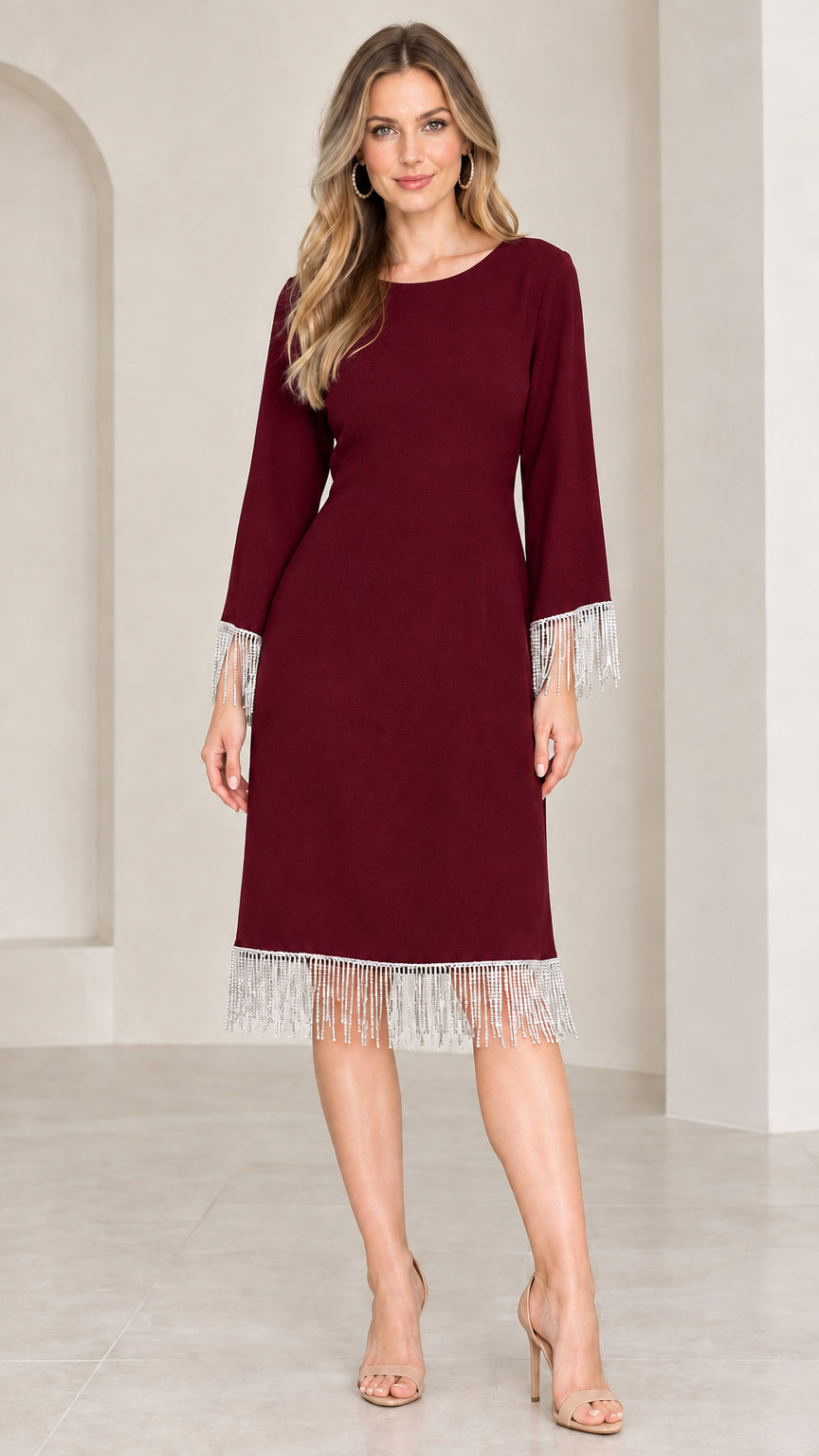 Front view of burgundy red knee-length party dress with rhinestone fringe