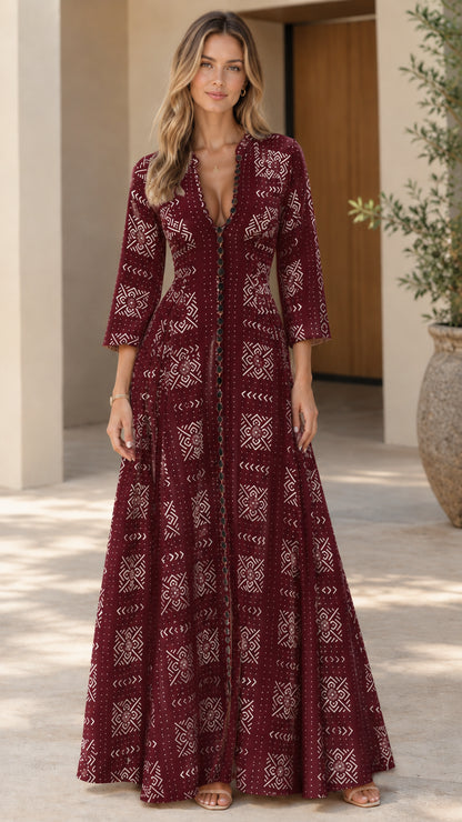 Front view of woman wearing burgundy geometric pattern button-down maxi dress