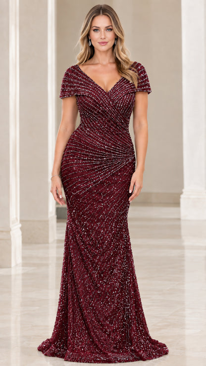 Front view of model wearing the burgundy red beaded mermaid evening dress