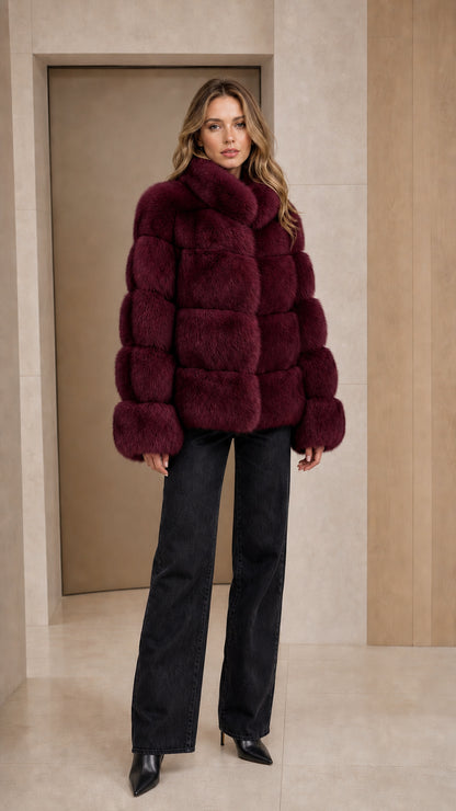 Model wearing deep burgundy wine faux fur stand collar jacket