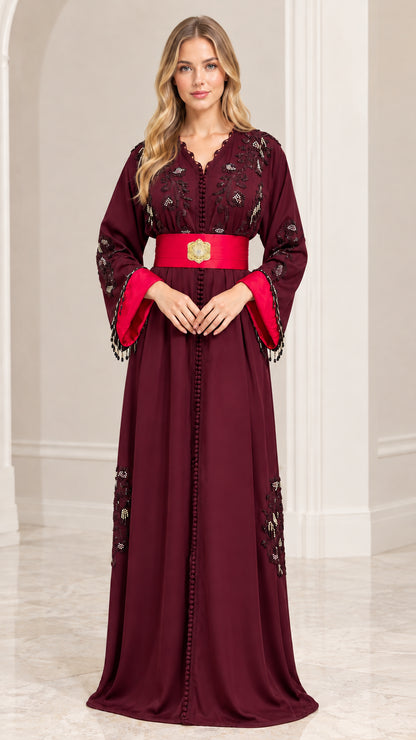 Front view of burgundy wine embroidered Moroccan kaftan dress with red belt