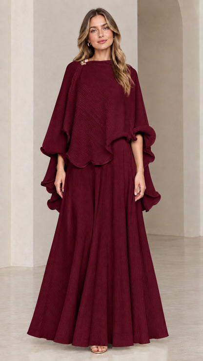 Model wearing burgundy wine red capelet top and maxi skirt set