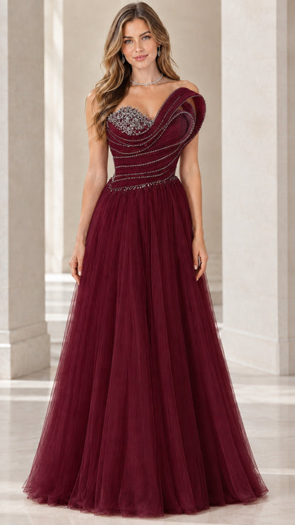 Front view of burgundy red asymmetric beaded bodice tulle ballgown
