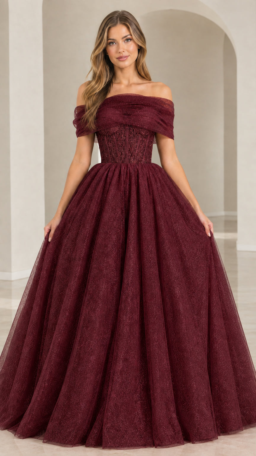 Model wearing Burgundy red shimmer tulle floor-length prom gown