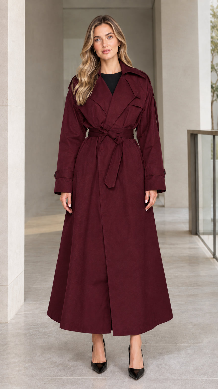 Front view of model wearing Burgundy wine full-length belted maxi trench coat