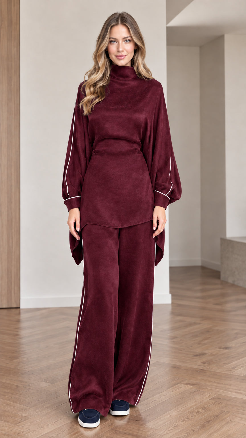 Front view of women wearing burgundy wine mock neck tunic top and wide leg pants set