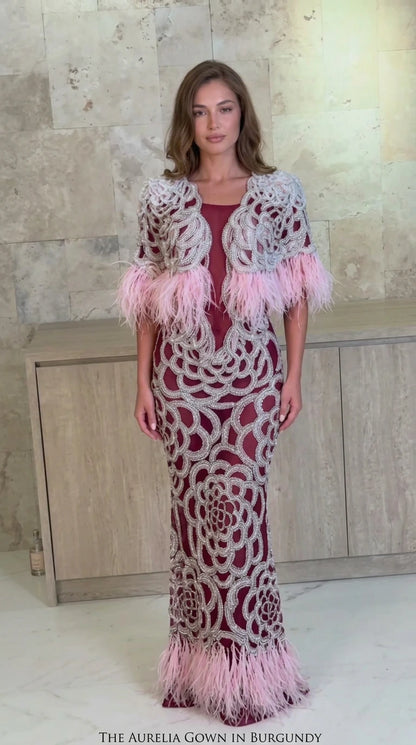 Burgundy and pink feather trimmed formal embroidered maxi gown