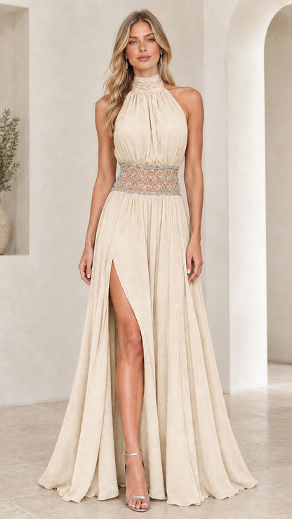 Champagne halter neck pleated maxi gown with rhinestone waistband