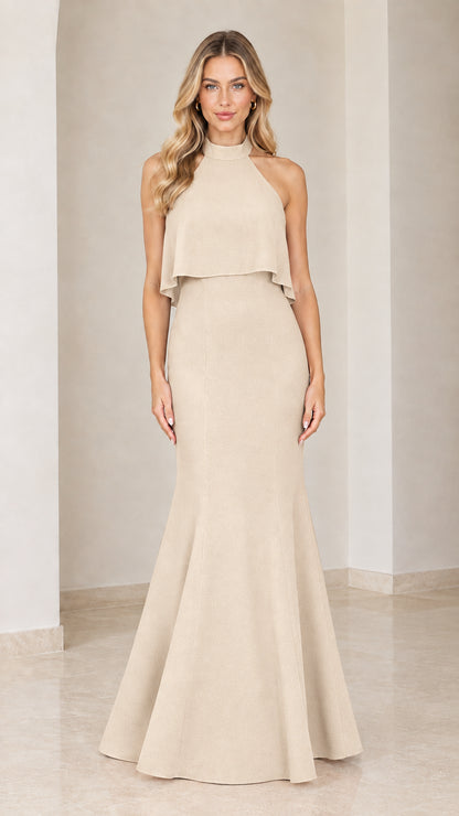 Model wearing the champagne halter neck mermaid formal gown