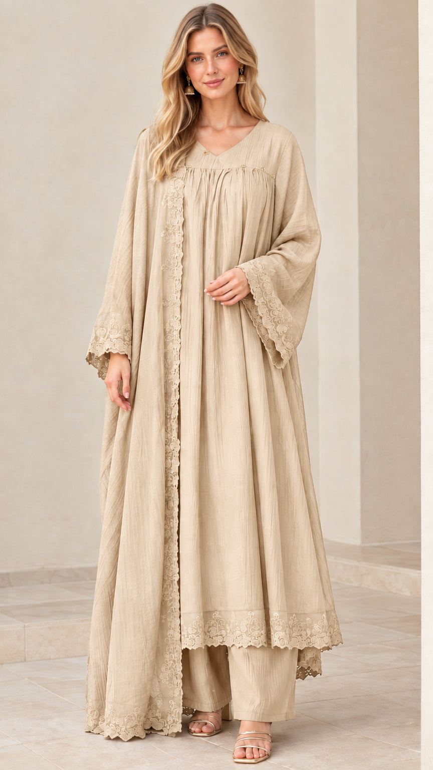 Model wearing elegant beige champagne 3-piece crinkle maxi cardigan set