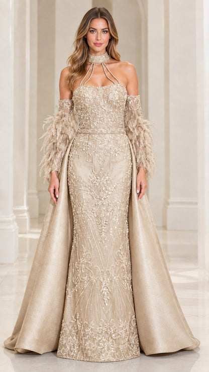 Front view of model wearing Champagne Gold sequin mermaid evening gown with satin overskirt and feather cuffs