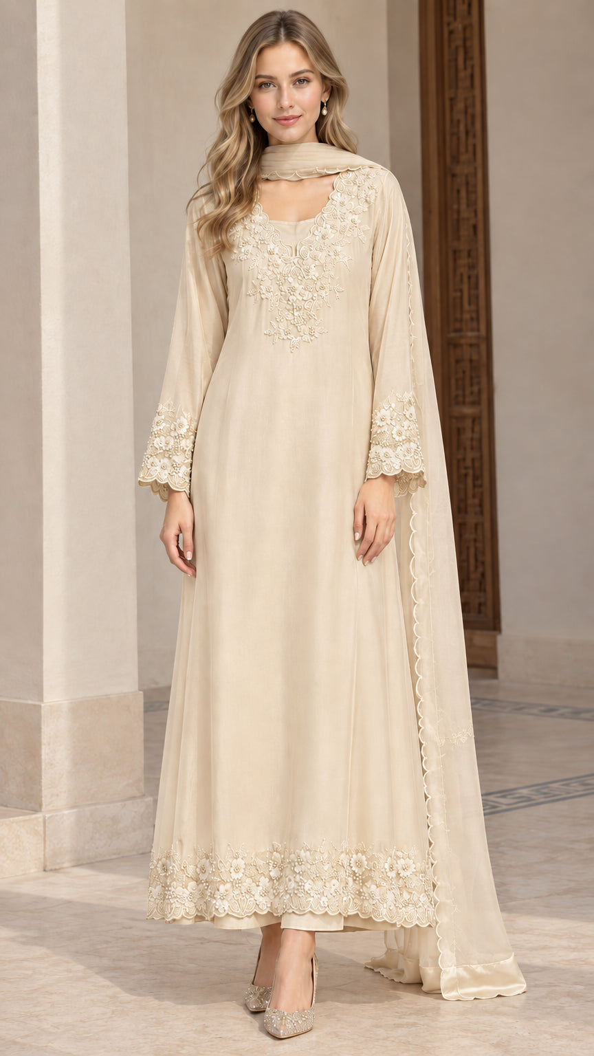 Front view of champagne beige embroidered long tunic and trouser set with scarf