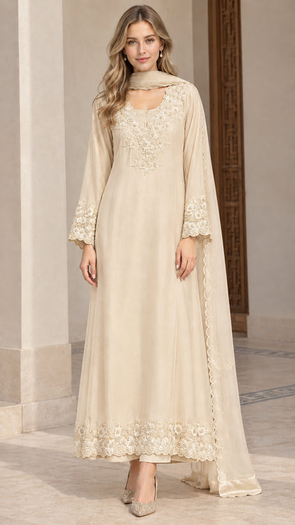 Front view of champagne beige embroidered long tunic and trouser set with scarf