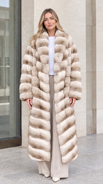 Model wearing Champagne Beige full-length tiered plush faux fur maxi coat