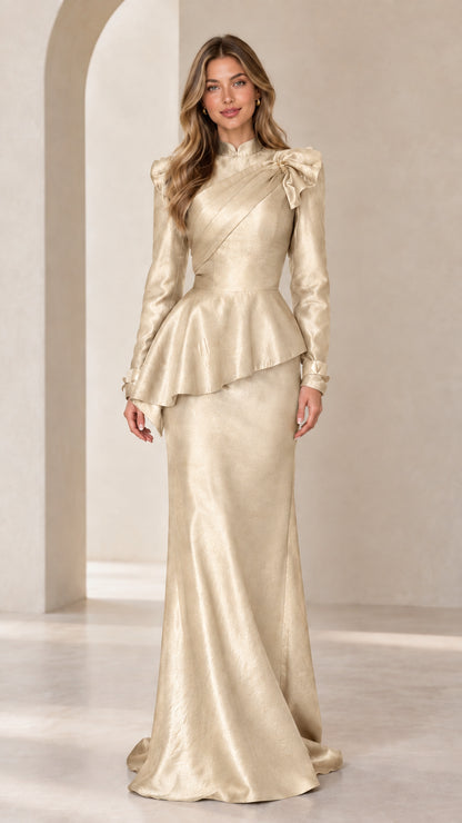 Champagne gold long sleeve peplum evening gown front view