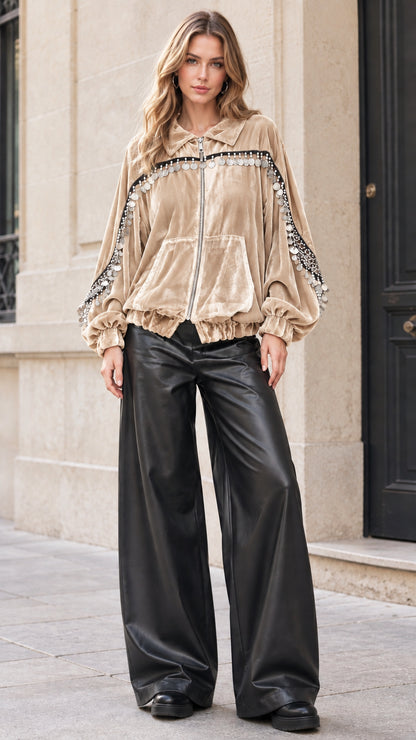 Model wearing beige champagne velvet zip-up jacket with coin accents
