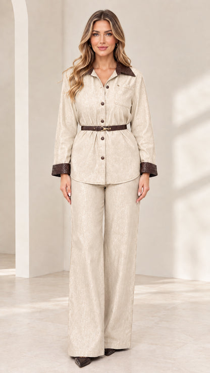 Front view of model wearing Cream off-white belted shirt and wide-leg trousers set
