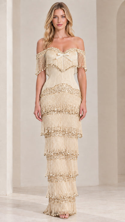 Front view of champagne off-shoulder tiered fringe maxi evening dress