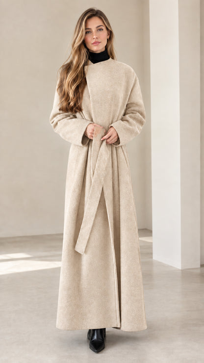 Model wearing cream beige maxi wrap coat with waist tie