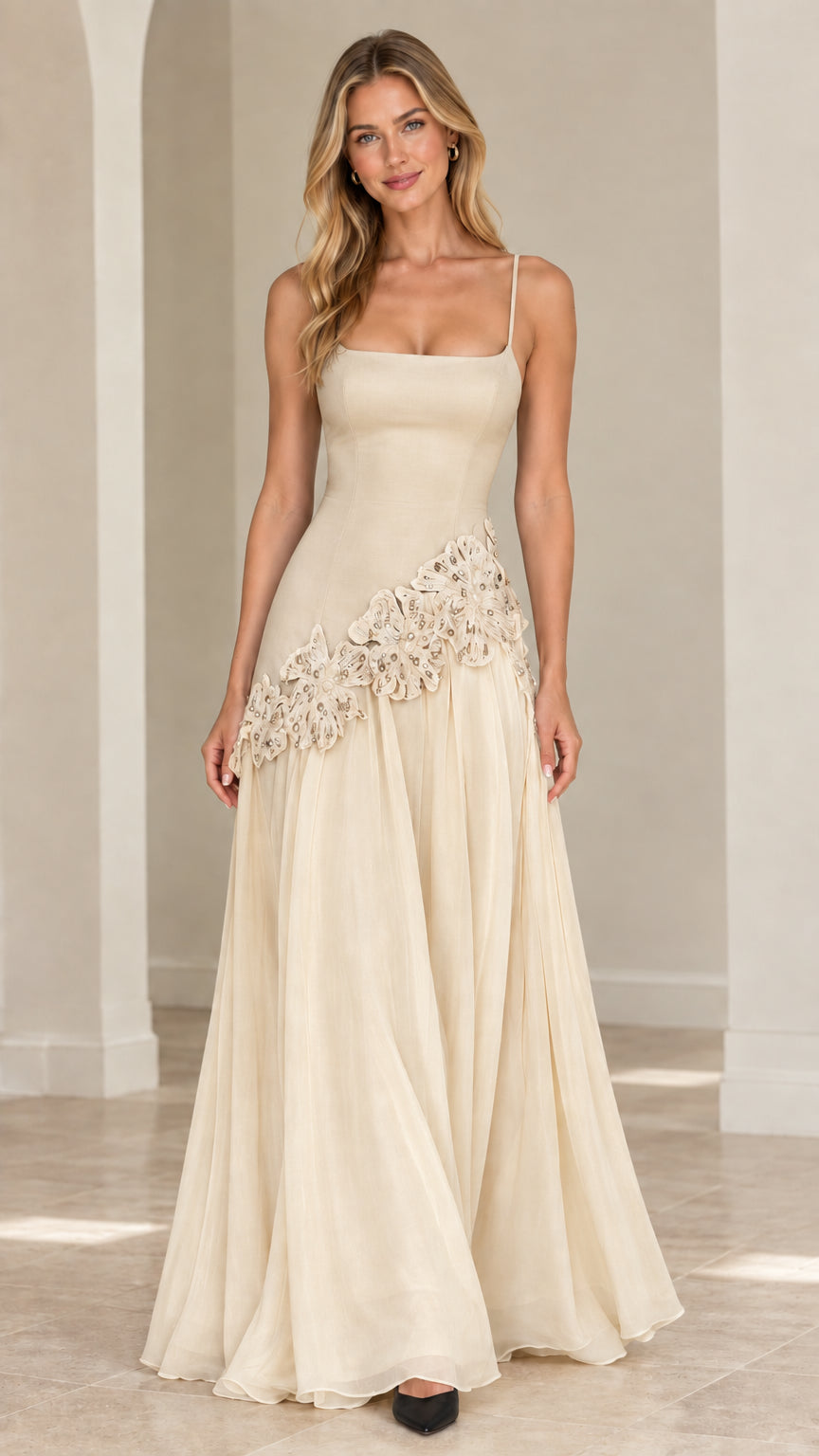 Full-length monochrome champagne cream evening gown with delicate lace embellishment