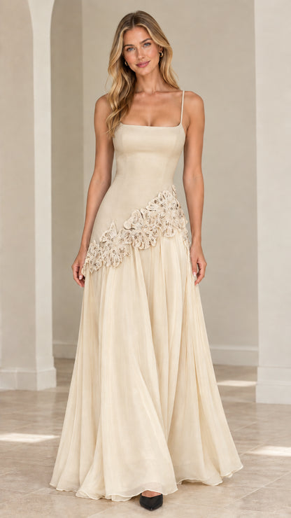 Full-length monochrome champagne cream evening gown with delicate lace embellishment