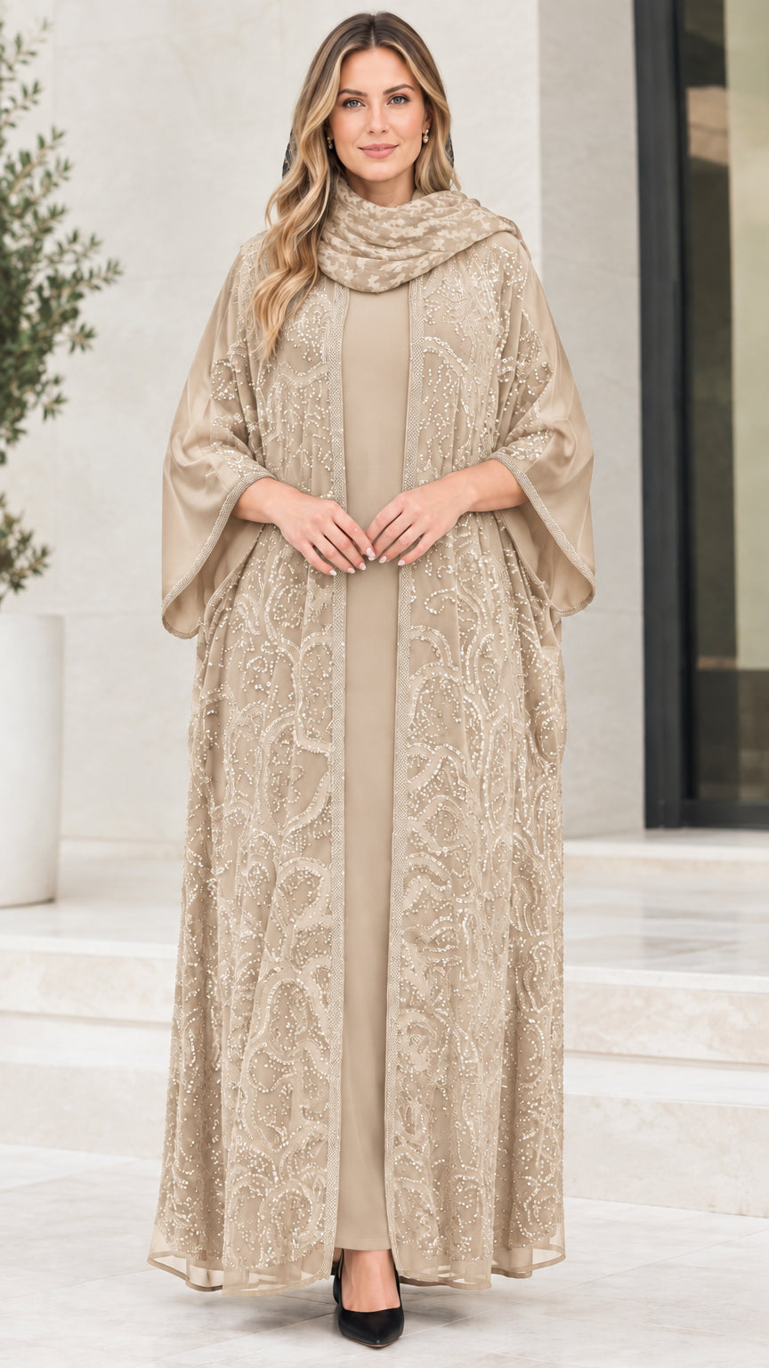Model wearing champagne beige sequin embroidered modest abaya 3-piece set
