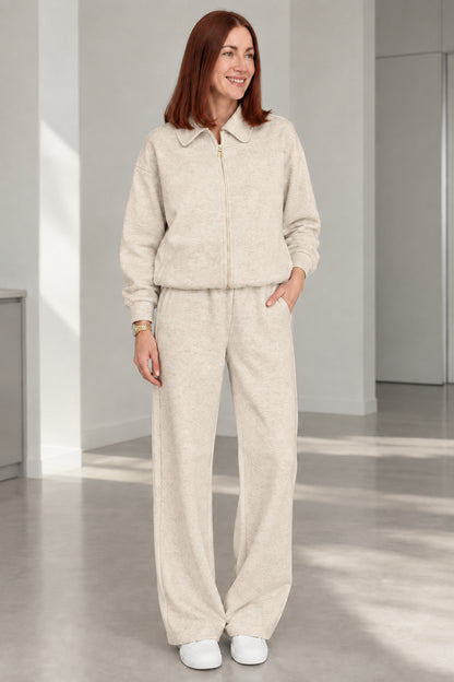 Woman wearing Oatmeal beige collared zip jacket and matching wide-leg pants