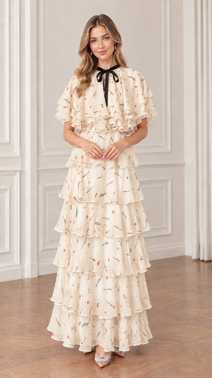 Beige floral tiered chiffon maxi dress with contrast neck bow