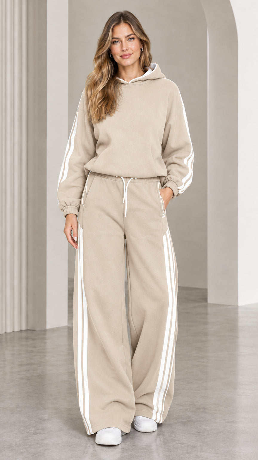 Beige two-piece hoodie and wide leg sweatpants tracksuit set with white side stripes