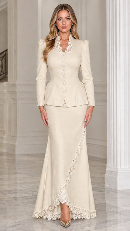 Front view of woman wearing champagne beige two-piece peplum skirt suit with lace trim