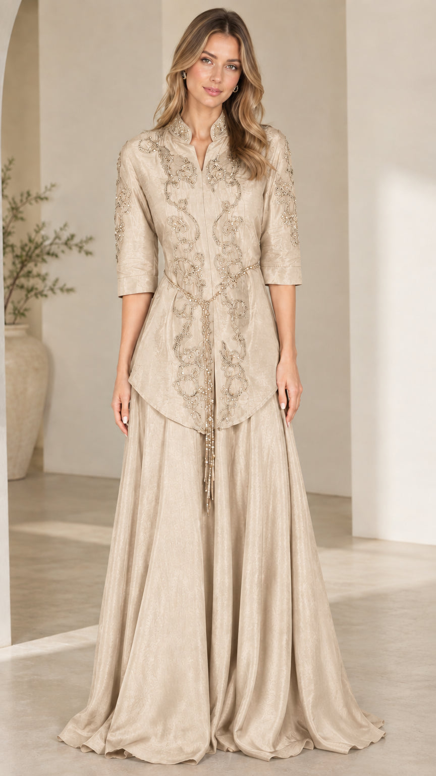 Front view of champagne embroidered floor-length formal evening gown