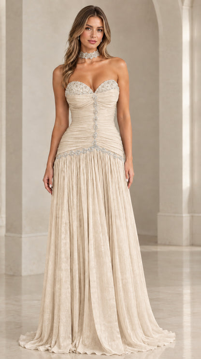 Champagne beige strapless ruched formal maxi gown with beadwork