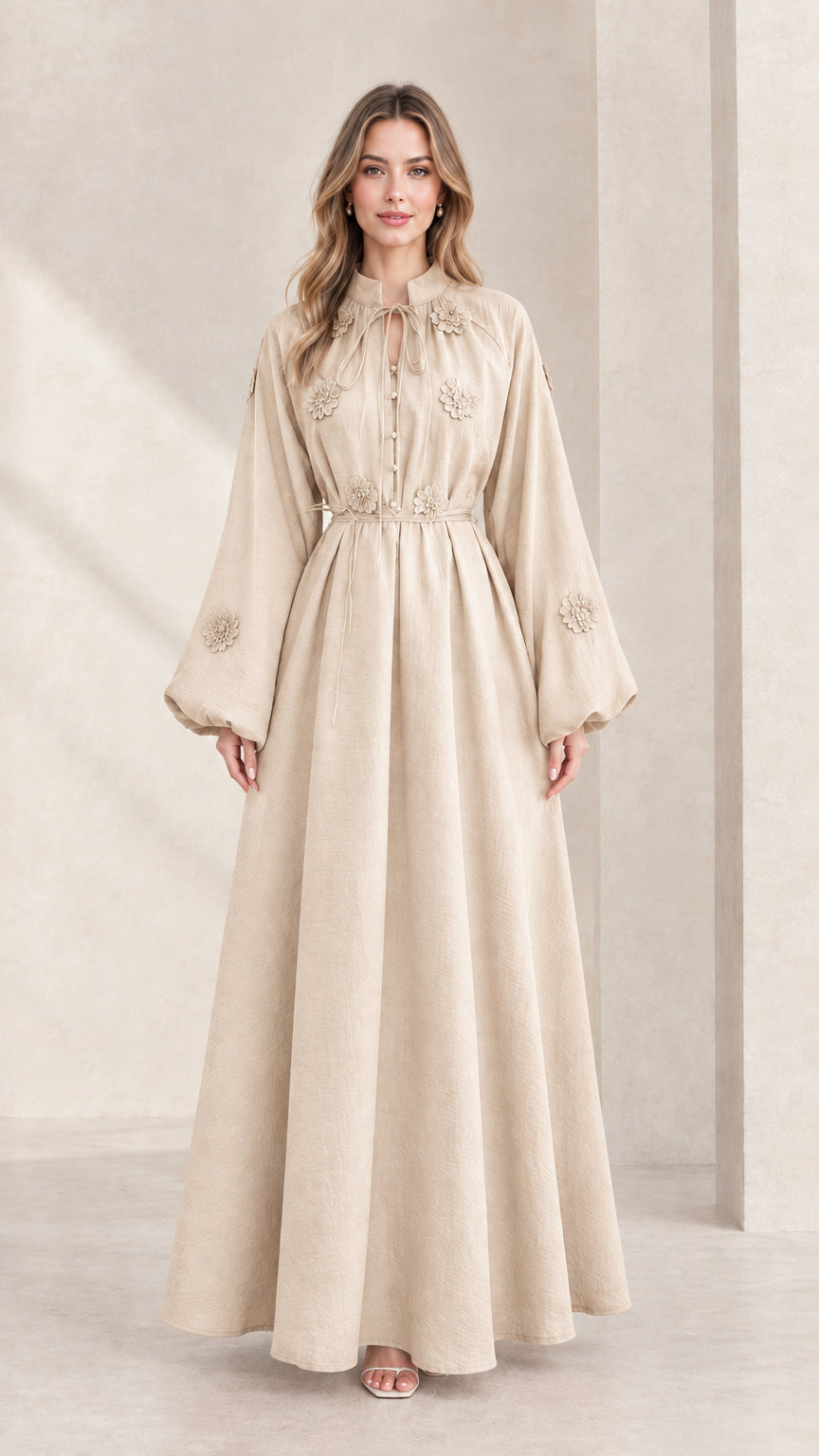 Front view of beige embroidered tie-neck lantern sleeve maxi dress