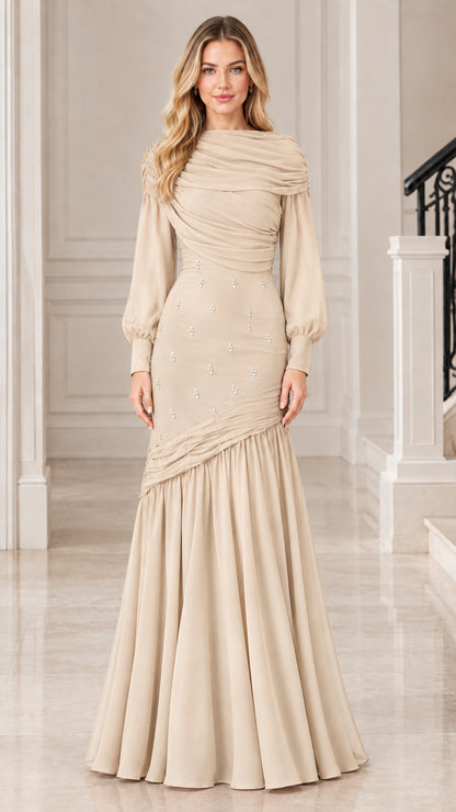 Model wearing Champagne beige long sleeve formal maxi dress with rhinestone detailing