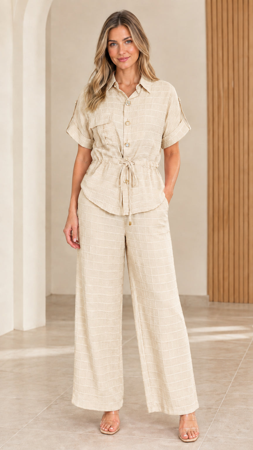 Full front view of model wearing beige textured two-piece matching loungewear set