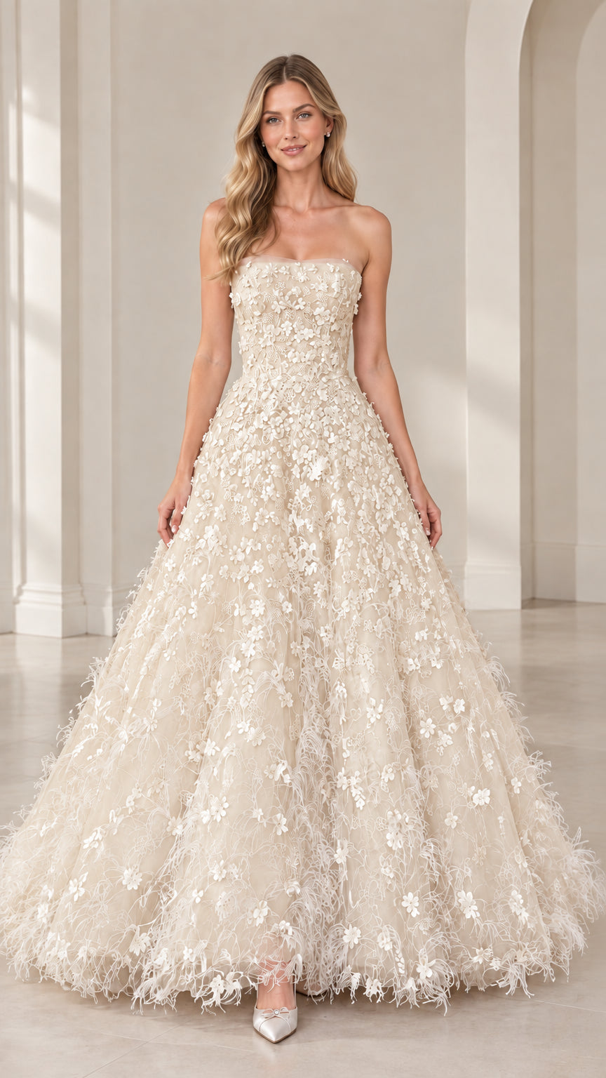 Model wearing strapless champagne floral applique ball gown