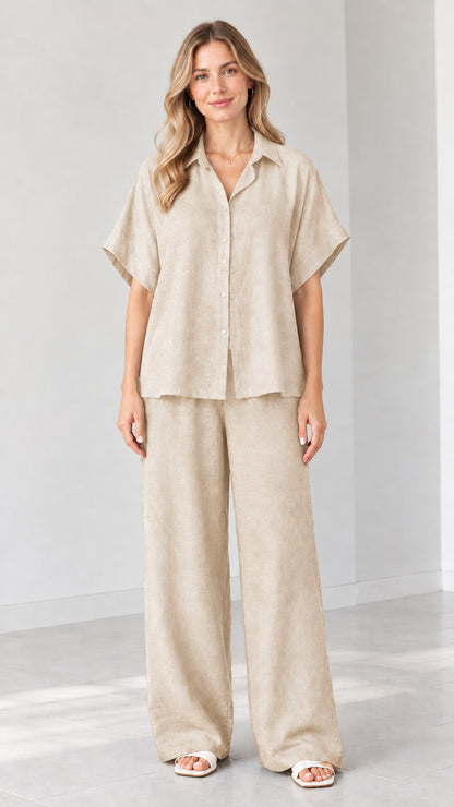 Model wearing Beige short-sleeve button-down shirt and wide-leg trousers