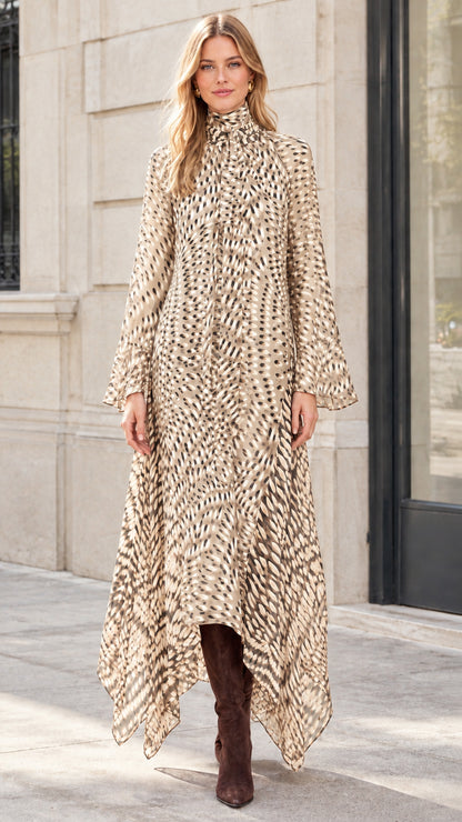 Model wearing Beige and cream printed flowing handkerchief hem maxi dress