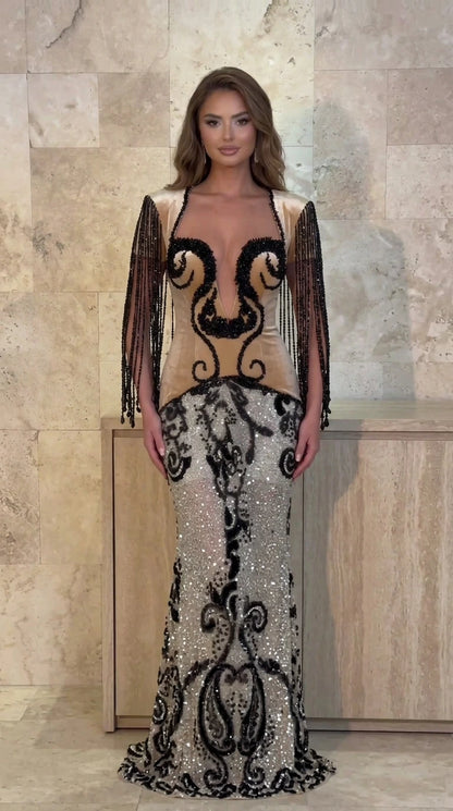Front view of champagne velvet plunge evening gown with black beading and silver sequin skirt
