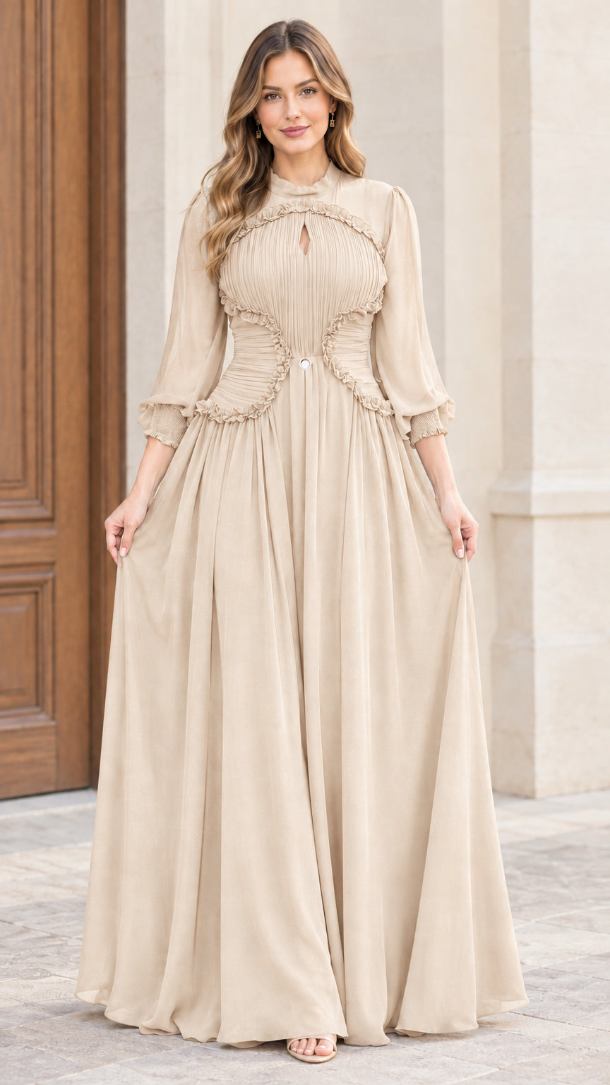 Front full-length view of woman wearing champagne beige pleated chiffon evening dress