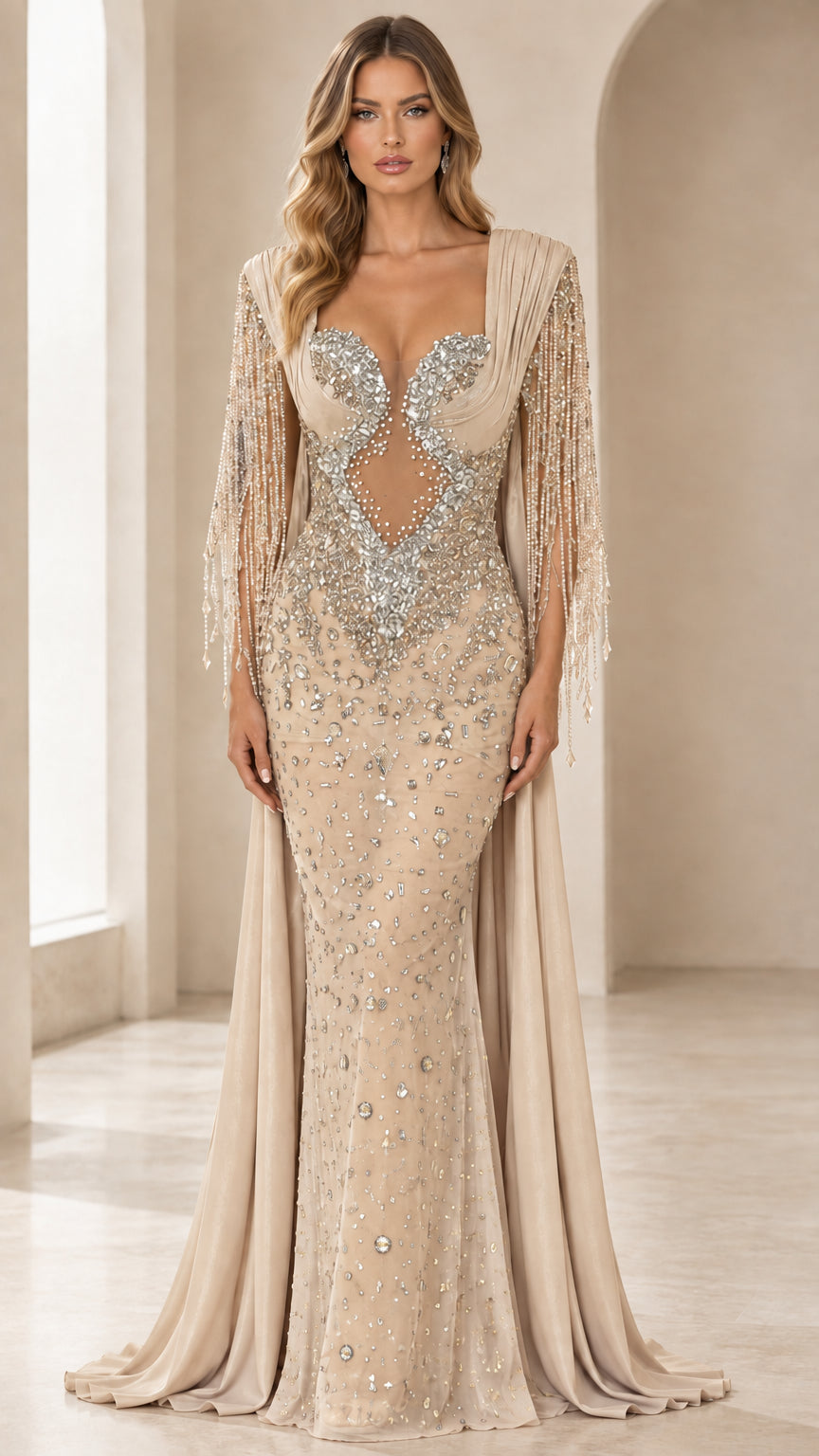 Front view of champagne gold crystal embellished formal gown with beaded fringe sleeves