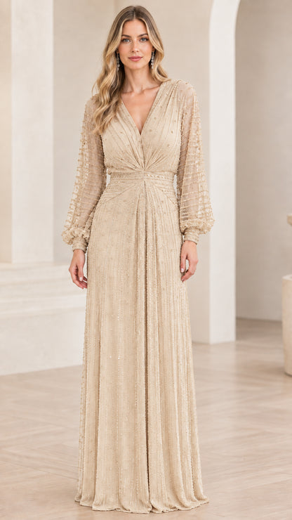 Front view of champagne beige pleated formal maxi gown